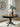 Clorazi Oval Dining Butterfly Extension Table - Black/Brown
