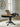 Clorazi Oval Dining Butterfly Extension Table - Black/Brown