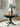 Clorazi Oval Dining Butterfly Extension Table - Black/Brown