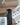 Ridgester Round End Table - Light Brown/Black